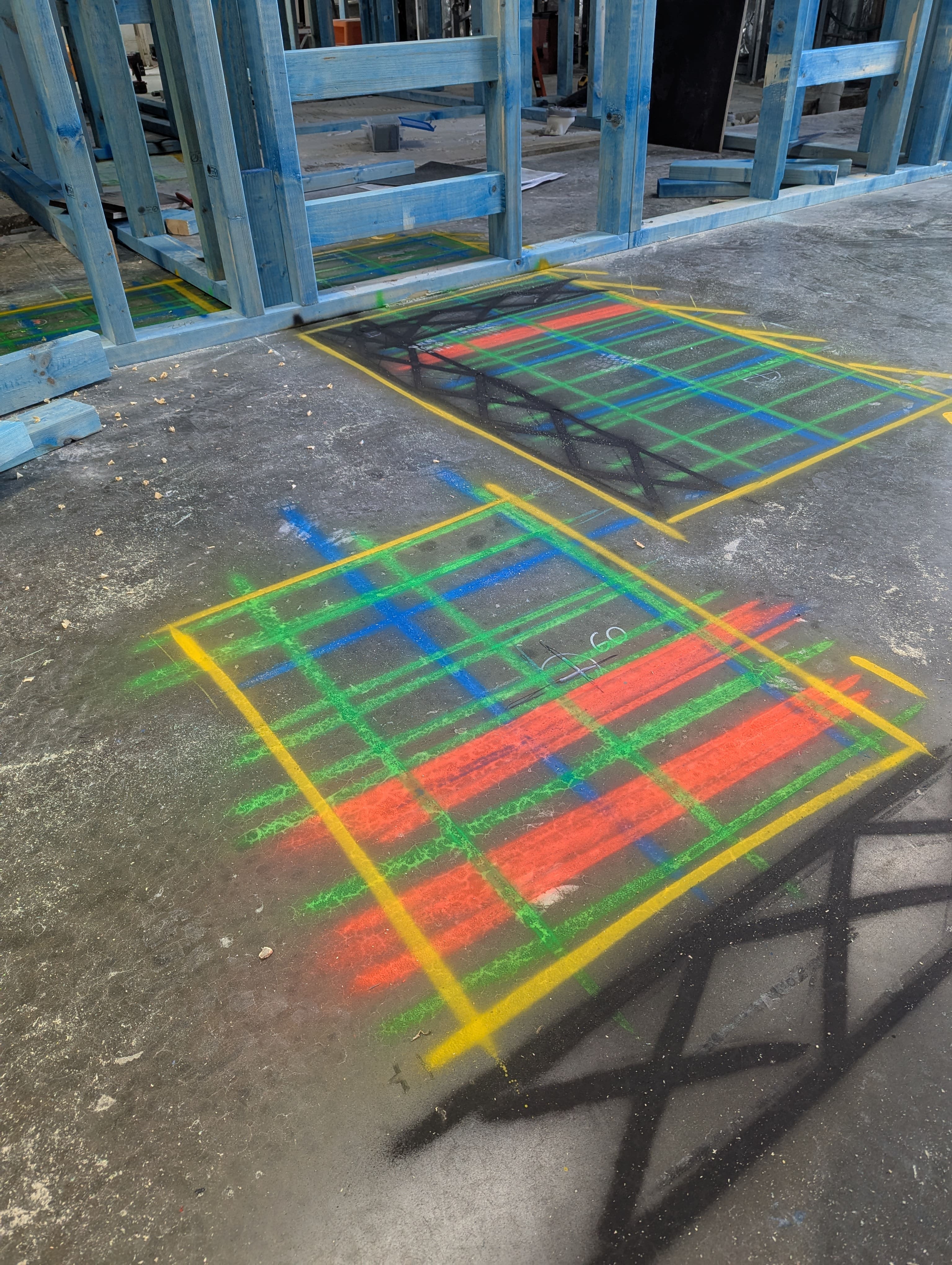 Concrete scan markings showing mapped embedded elements at a Bunnings project